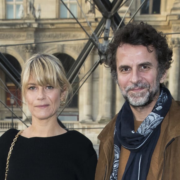 Marina Foïs et Eric Lartigau au défilé de mode "Louis Vuitton", collection prêt-à-porter Automne-Hiver 2017-2018 au musée du Louvre à Paris, le 7 Mars 2017.© Olivier Borde/Bestimage 