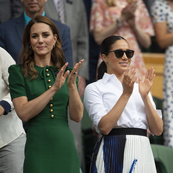 Catherine (Kate) Middleton, duchesse de Cambridge, Meghan Markle, duchesse de Sussex, et Pippa Middleton dans les tribunes lors de la finale femme de Wimbledon "Serena Williams - Simona Halep (2/6 - 2/6) à Londres, le 13 juillet 2019. 