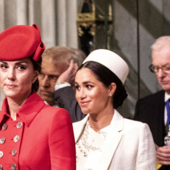 Catherine Kate Middleton, duchesse de Cambridge, Meghan Markle, enceinte, duchesse de Sussex lors de la messe en l'honneur de la journée du Commonwealth à l'abbaye de Westminster à Londres le 11 mars 2019. 