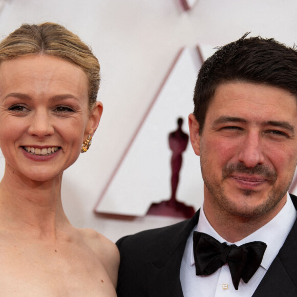 CAREY MULLIGAN and MARCUS MUMFORD - Photocall - 93ème cérémonie des Oscars dans la gare Union Station à Los Angeles, le 25 avril 2021. © Matt Petit/AMPAS/ZUMA Wire/Bestimage