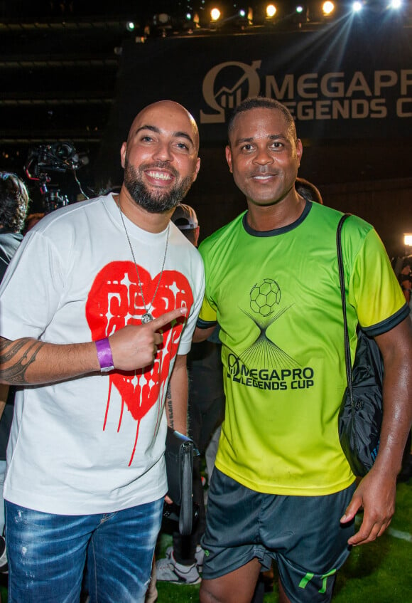 Paulo Tuynman et Patrick Kluivert - Match de football de la première édition du match de football "Omegapro Legends Cup" au pied de la tour Burj Khalifa à Dubaï le 12 mai 2022. © Nicolas Briquet / Bestimage