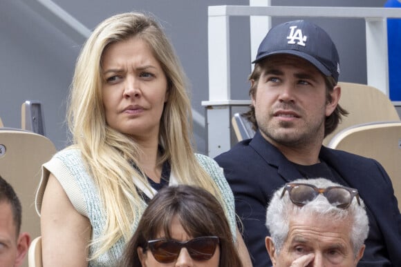 Carine Galli et son compagnon Giovanni Castaldi - Célébrités dans les tribunes des internationaux de France de Roland Garros à Paris le 31 mai 2022. © Cyril Moreau - Dominique Jacovides/Bestimage