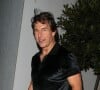 Tom Cruise à la sortie de l'hôtel "Dorchester" à Londres, le 19 juillet 2022.