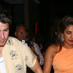 Nick Jonas et sa femme Priyanka Chopra à la sortie du restaurant Catch Steak à Los Angeles. Le 17 août 2022 