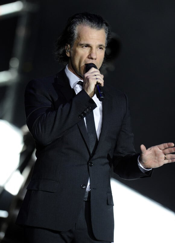 Bruno Pelletier (Pierre Gringoire dans "Le temps des cathedrales") - Les chanteurs de la comedie musicale Notre Dame de Paris en concert au stade Olympiysky a Moscou. Le 7 mars 2013 
