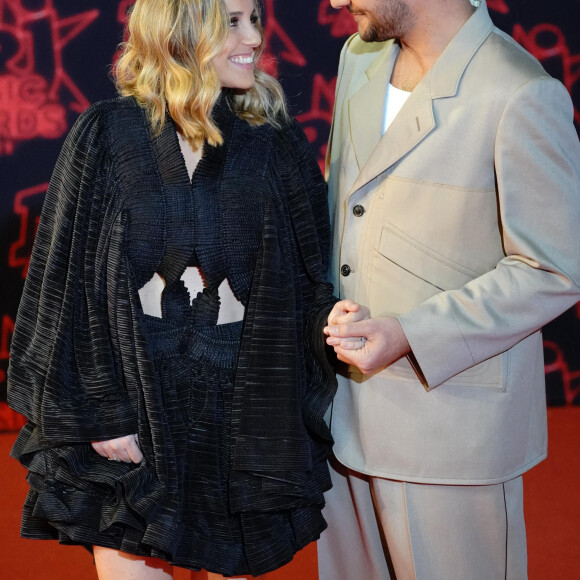Amir et sa femme Lital lors de la 23ème édition des NRJ Music Awards 2021 au Palais des Festivals de Cannes, le 20 novembre 2021. 
