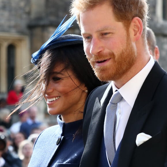 Le prince Harry, duc de Sussex, et Meghan Markle, duchesse de Sussex - Sorties après la cérémonie de mariage de la princesse Eugenie d'York et Jack Brooksbank en la chapelle Saint-George au château de Windsor, Royaume Uni, le 12 octobre 2018. 