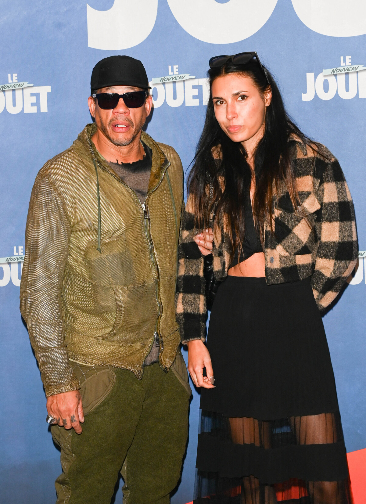 Photo : JoeyStarr et une amie - Avant-première du film Le Nouveau Jouet  au Grand Rex à Paris le 9 octobre 2022. © Coadic GuirecBestimage -  Purepeople