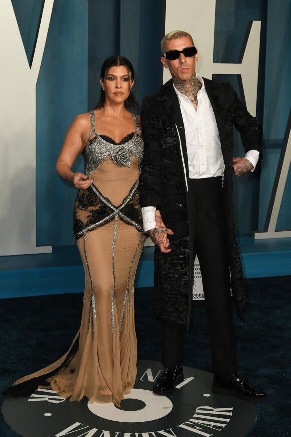 Kourtney Kardashian and Travis Barker au photocall de la soirée "Vanity Fair" lors de la 94ème édition de la cérémonie des Oscars à Los Angeles, le 27 mars 2022. 