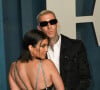 Kourtney Kardashian and Travis Barker au photocall de la soirée "Vanity Fair" lors de la 94ème édition de la cérémonie des Oscars à Los Angeles.