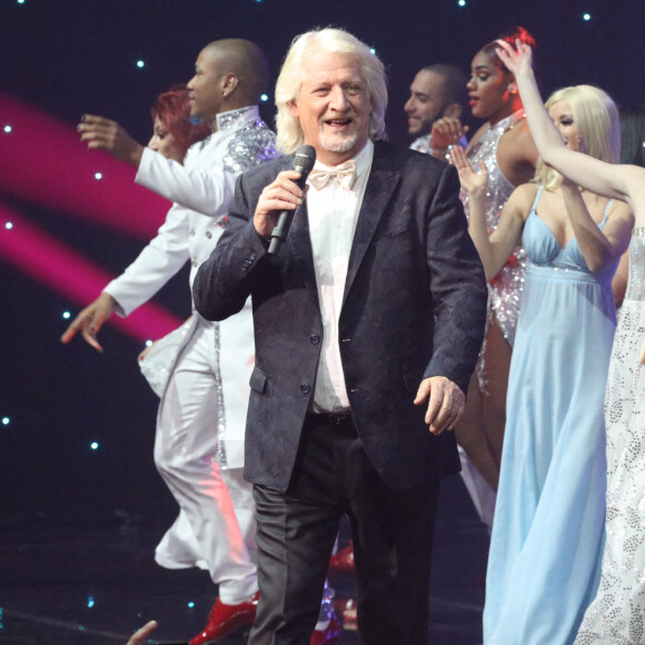 "Petit scoop : c'est la première fois que je veux faire un duo d'animation", a-t-il déclaré dans un premier temps, avant d'annoncer que son partenaire sera Patrick Sébastien.
Exclusif - Patrick Sébastien - Spectacle "Le plus grand cabaret du monde" présenté par Patrick Sébastien au Dôme de Paris le 5 novembre 2021. © Bahi/Bestimage 