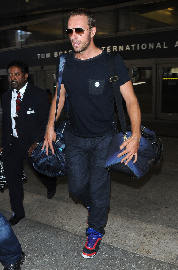 Chris Martin arrive à Los Angeles le 6 septembre 2014. 