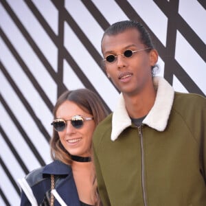 Le chanteur Stromae, se laisse pousser les cheveux, et sa femme Coralie Barbier - People sortant du défilé de mode "Louis Vuitton", collection prêt-à-porter Printemps-Eté 2017 à Paris, le 5 octobre 2016. © CVS/Veeren/Bestimage