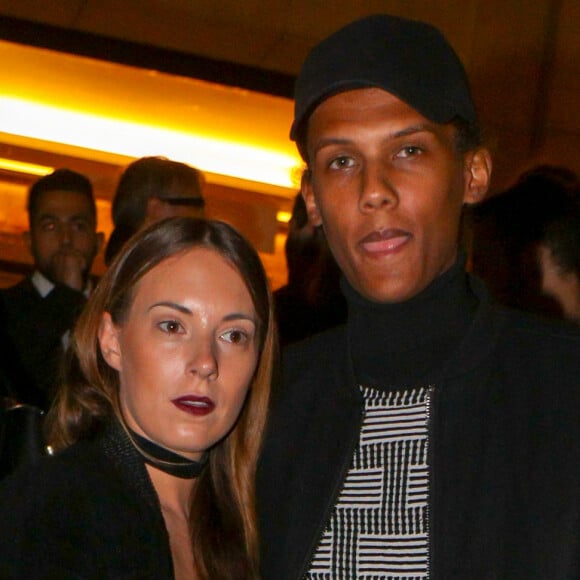 Le chanteur Stromae et sa femme Coralie Barbier - Défilé de mode "Kenzo" collection prêt-à-porter Printemps-Eté 2017 lors de la Fashion Week de Paris à la Cité de l'architecture et du patrimoine au Trocadéro à Paris, France, le 4 octobre 2016. © Agence/Bestimage