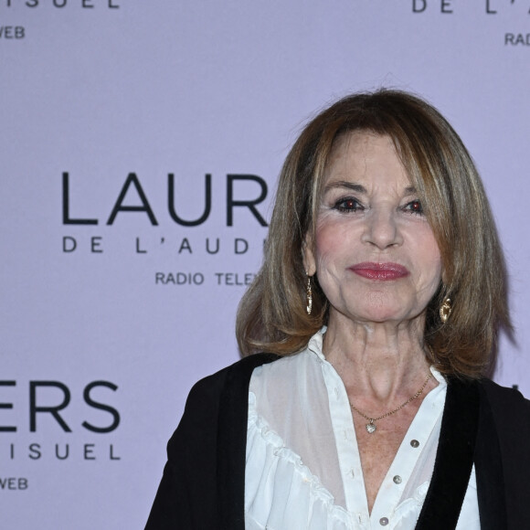 Celui-ci n'est autre que l'acteur et réalisateur Jean Yanne. "Il ne s'en est pas remis, je crois", avouait l'actrice en mai 2019 au micro de la radio Europe 1 à propos de cette relation.
Nicole Calfan - 28ème cérémonie des Lauriers de l'Audiovisuel au théâtre Marigny à Paris le 20 février 2023. © Coadic Guirec/Bestimage