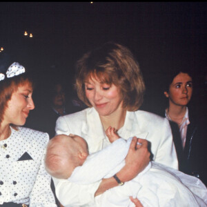 François Valéry et Nicole Calfan en 1987 lors du baptême de leur fils Jérémy. Sa marraine est Mirelle Darc.