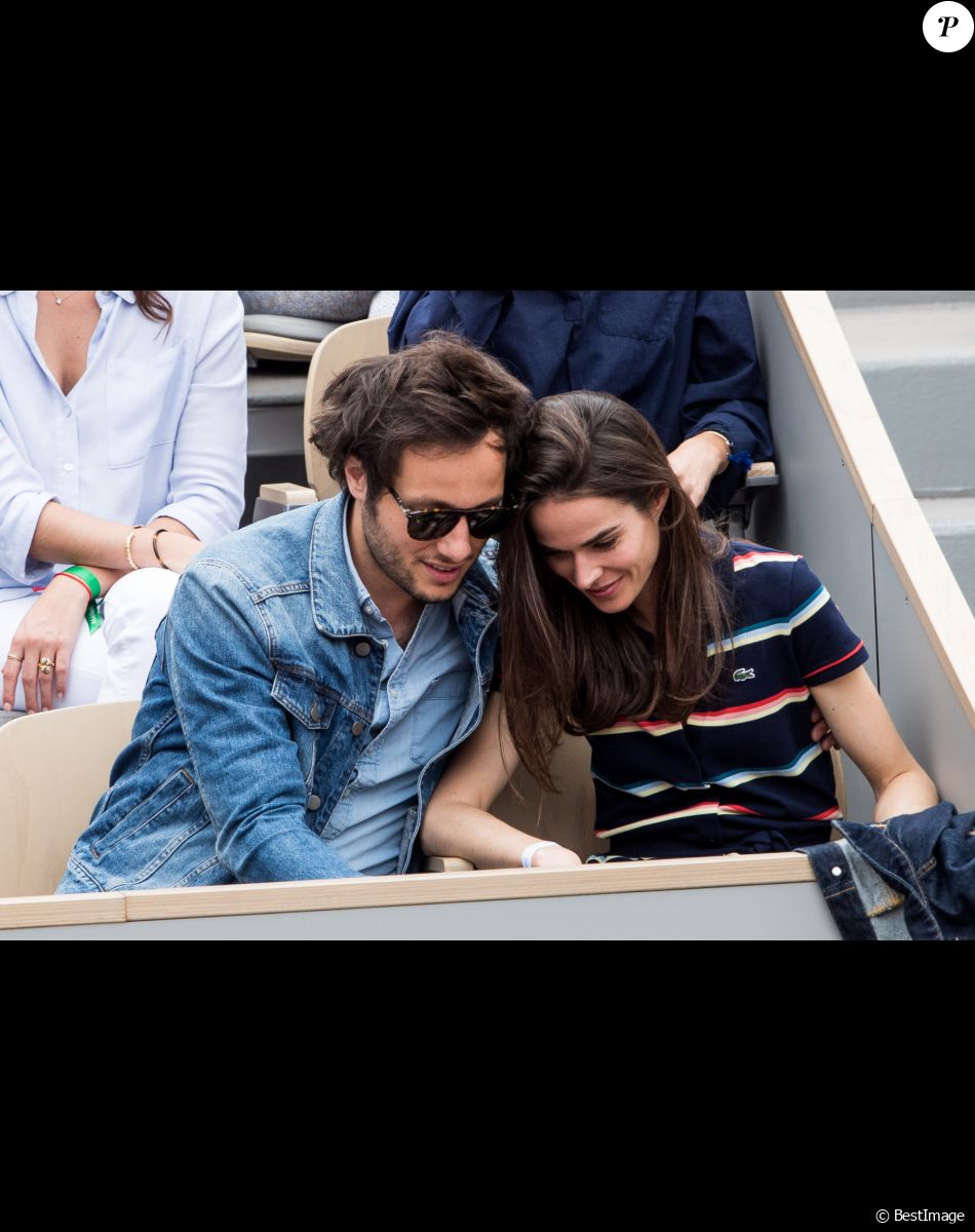 Vianney Bureau (Vianney) et sa compagne Catherine Robert - People dans les tribunes lors de la finale messieurs des internationaux de France de tennis de Roland Garros 2019 à Paris le 9 juin 2019. © Jacovides-Moreau/Bestimage People in the stands during the final of the men's international tennis Roland Garros 2019 in Paris on June 9, 2019.