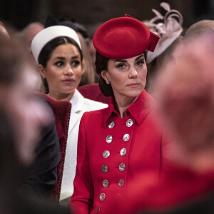 Kate Middleton est arrivé à bout de patience avec Meghan Markle 
Catherine Kate Middleton, duchesse de Cambridge, Meghan Markle, enceinte, duchesse de Sussex lors de la messe en l'honneur de la journée du Commonwealth à l'abbaye de Westminster à Londres. 