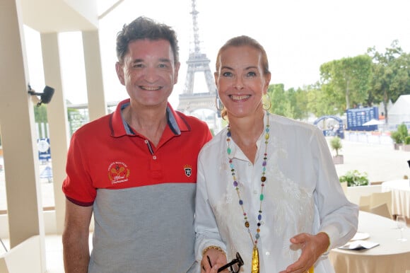 Exclusif - Philippe Sereys de Rothschild et sa compagne Carole Bouquet dans l'espace VIP du Longines Paris Eiffel Jumping au Champ de Mars à Paris le 7 juillet 2019.