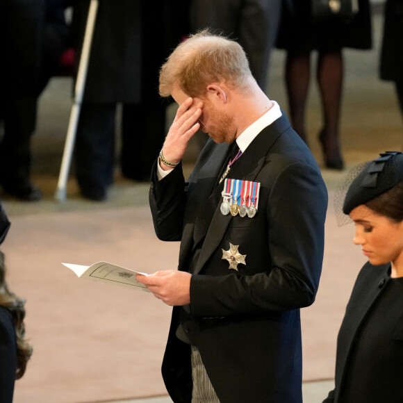 Kate Catherine Middleton, princesse de Galles, le prince Harry, duc de Sussex, Meghan Markle, duchesse de Sussex - Intérieur - Procession cérémonielle du cercueil de la reine Elisabeth II du palais de Buckingham à Westminster Hall à Londres. Le 14 septembre 2022 