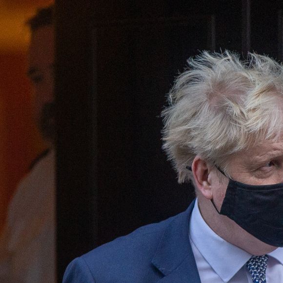 Le Premier ministre britannique Boris Johnson, au coeur d'un scandale, se rend au Parlement à Londres, le 12 janvier 2022.