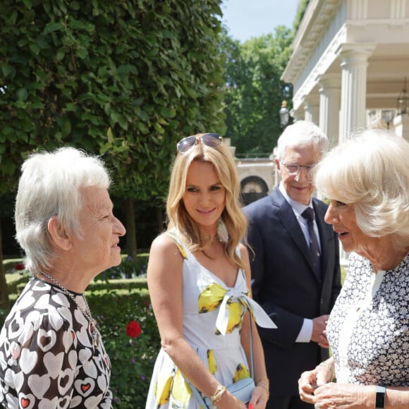 Deux maisons qui ont appartenu à Queen Mum, la mère d'Elizabeth II. 
Camilla Parker Bowles, duchesse de Cornouailles, lors d'une réception à la Clarence House à Londres, à l'occasion du 160ème anniversaire du Refuge animalier pour chiens et chats de Battersea. Le 14 juillet 2022 