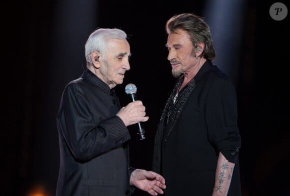 Johnny Hallyday et Charles Aznavour, pour La Fête de la Chanson Française, le 13 janvier 2013. © Dominique Jacovides / Bestimage