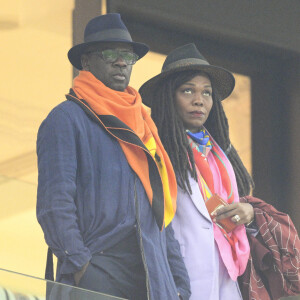 C'est ce qu'on apprend lors d'un portrait consacré à Kareen Guiock dans "Libération"
Lilian Thuram et sa femme en tribune avant le match de football de quart de finale opposant la France à l'Angleterre lors de la coupe du Monde (FIFA 2022) au stade Al Bayt à Al Khor au Qatar, le 10 décembre 2022. © Jean-Baptiste Autissier/Panoramic/Bestimage