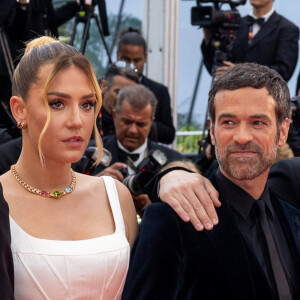 Adèle Exarchopoulos et Romain Duris ont foulé le tapis rouge pour la montée des marches du film "Monster" à l'occasion du 76ème Festival de Cannes.
Tom Mercier, Adèle Exarchopoulos, Romain Duris - Montée des marches du film " Kaibutsu (Monster) " lors du 76ème Festival International du Film de Cannes, au Palais des Festivals à Cannes. © Olivier Borde / Bestimage