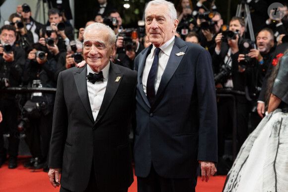 C'est avec plaisir que Robert de Niro a accepté de tourner, à nouveau, pour son ami Martin Scorsese.
Martin Scorsese, Robert de Niro - Descente des marches du film " Killers of the flower moon " lors du 76ème Festival International du Film de Cannes, au Palais des Festivals à Cannes. © Olivier Borde / Bestimage