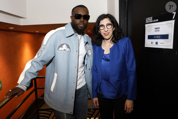 Exclusif - Gims et Rima Abdul Malak, ministre de la Culture en backstage de l'émission "Unis face au séisme" à l'Olympia diffusée en direct sur France 2 le 14 mars 2023. Au terme de l'émission, les promesses de dons s'élevaient à 2,3 millions d'euros. Unis face au séisme est un grand concert de solidarité pour les populations turque et syrienne. Pour venir en aide aux milliers de familles victimes des séismes en Turquie et en Syrie, France Télévisions poursuit sa mobilisation aux côtés de la Fondation de France en organisant un grand concert en direct de l'Olympia, mardi 14 mars. L.Salamé et S.Bern ont présenté cette soirée de solidarité à laquelle ont participé des artistes français, turcs et syriens. Le 6 février 2023, deux séismes exceptionnels de magnitude 7,8 et 7,6 ont frappé le sud de la Turquie et le nord-ouest de la Syrie, faisant au moins 52 000 morts et détruisant des milliers d'habitations. Cette catastrophe est la plus meurtrière que la région ait connue depuis des siècles. Plus d'un mois après, la situation reste toujours extrêmement critique et les besoins d'urgence, l'aide alimentaire, l'accès à l'eau potable, la mise à l'abri des populations restent toujours d'actualité, alors que les températures sont particulièrement froides. Dans le nord-ouest de la Syrie, les 180 000 personnes déplacées par le tremblement de terre s'ajoutent aux 2,8 millions de personnes qui vivent déjà dans des conditions difficiles et précaires après avoir été déplacées à plusieurs reprises par la guerre qui dure depuis douze ans. © Cyril Moreau / Christophe Clovis / Bestimage 