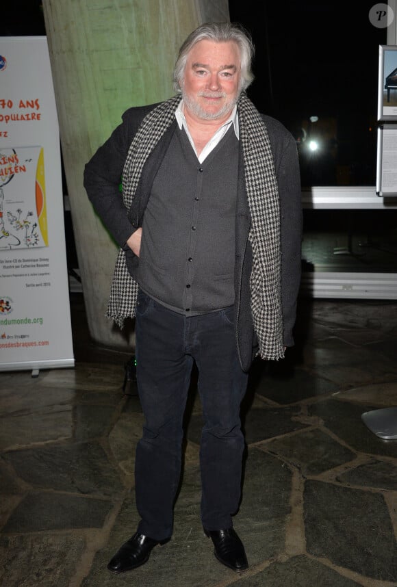 Christian Rauth - Début de la tournée des "Pères Noël verts" 2014 à l'occasion des 70 ans du Secours populaire au Palais de l'Unesco à Paris le 8 décembre 2014.