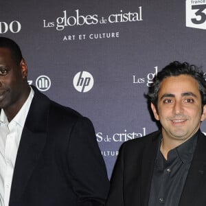 Omar Sy et François Cluzet n'ont pas tardé à réagir en apprenant la triste nouvelle.
François Cluzet, Omar Sy, Eric Toledano et Olivier Nakache au photocall de la Cérémonie des Globes de Cristal au Lido de Paris, en 2012.
© Guillaume Gaffiot / Bestimage