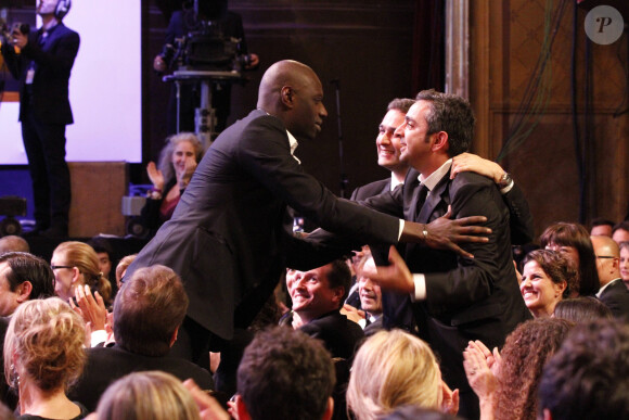 Omar Sy, Olivier Nakache, Eric Toledano étaient présents à la 37ᵉ cérémonie des César au Théâtre du Châtelet à Paris, le 24 février 2012.
© Rindoff-Borde / Bestimage