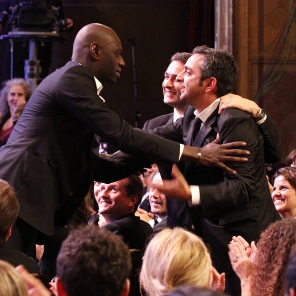 Omar Sy, Olivier Nakache, Eric Toledano étaient présents à la 37ᵉ cérémonie des César au Théâtre du Châtelet à Paris, le 24 février 2012.
© Rindoff-Borde / Bestimage