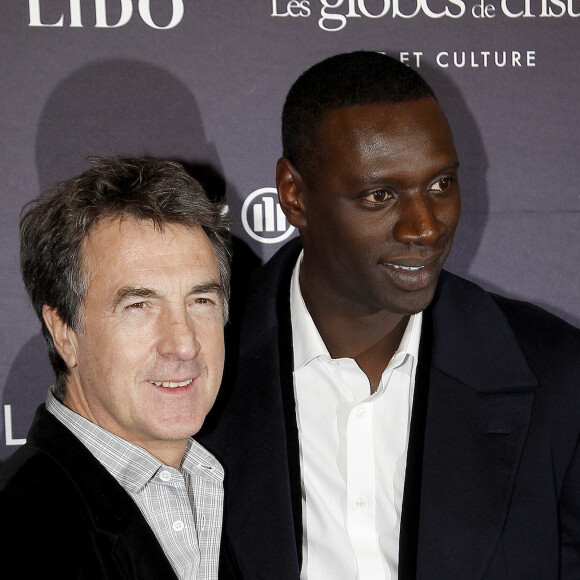 François Cluzet et Omar Sy aux Globes de Cristal, à Paris, en 2012.
© Guillaume Gaffiot /Bestimage