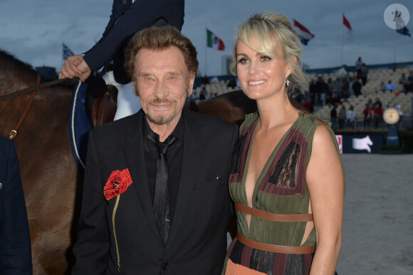 Johnny Hallyday et sa femme Laeticia Hallyday - Remise du Prix Eiffel avec Johnny et Laeticia Hallyday - Record du saut en hauteur de la ville de Paris / EOS - Longines Paris Eiffel Jumping à la plaine de Jeux de Bagatelle à Paris le 1er juillet 2016. Cette remise de prix est le prologue de la soirée au profit de l'association "La bonne étoile" de Laeticia Hallyday. © Olivier Borde / Veeren / Bestimage