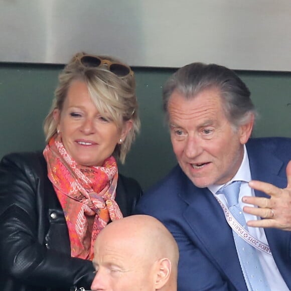 Sophie Davant et William Leymergie - People dans les tribunes des Internationaux de France de tennis de Roland Garros à Paris. Le 26 mai 2015