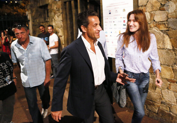 Nicolas Sarkozy et son epouse Carla Bruni sont venus assister a la representation de Julien Clerc dans le cadre du festival de Ramatuelle le 3 aout 2013.