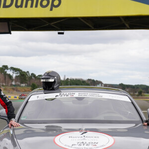 Exclusif - Maëva Coucke (pour l'association Les bonnes fées) et son co-pilote Jean-Baptiste Dessort lors de la 4ème édition du challenge automobile caritatif "Talon Piste" sur le circuit Bugatti au Mans le 19 mars 2023. © Anne-Sophie Guebey / Bestimage 