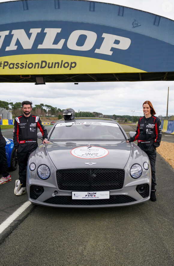 Exclusif - Maëva Coucke (pour l'association Les bonnes fées) et son co-pilote Jean-Baptiste Dessort lors de la 4ème édition du challenge automobile caritatif "Talon Piste" sur le circuit Bugatti au Mans le 19 mars 2023. © Anne-Sophie Guebey / Bestimage 