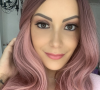 Sur Instagram, elle s'est dévoilée avec une perruque étonnante afin de faire la "fête".
Virgilia Hess (BFMTV) craque pour une perruque étonnante pour se rendre à sa toute dernière séance de chimiothérapie. Instagram