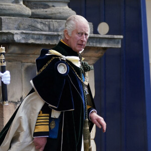 Charles III a été couronné une deuxième fois en Ecosse comme le veut la tradition.
Le roi Charles III et la reine Camilla quittent le palais d'Holyrood à Edimbourg pour la suite du deuxième couronnement de Charles III. @ Robert Perry/PA Wire