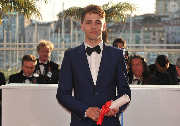 Xavier Dolan a décidé de prendre sa retraite
Xavier Dolan (Prix du jury pour "Mommy") - Photocall de la remise des palmes du 67 ème Festival du film de Cannes – Cannes le 24 mai 2014. 
