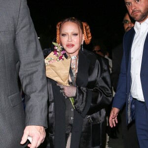 Si elle a choisi de faire un retour en mouvement et chorégraphie, soufflant un tendre baiser à la caméra, ce n'est pas vraiment pour rien.
Exclusif - Madonna à l'after-party au club "Delilah" lors de la 65ème édition de la cérémonie des "Grammy Awards" à Los Angeles, le 5 février 2023.