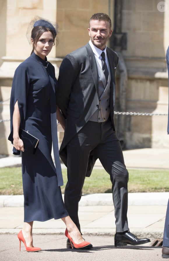 David Beckham et sa femme Victoria - Sortie de la chapelle St. George au château de Windsor, Royaume Uni, le 19 mai 2018.