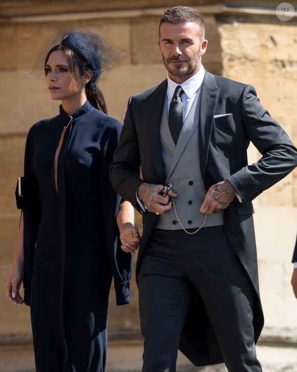 David Beckham et sa femme Victoria - Sortie de la chapelle St. George au château de Windsor, Royaume Uni, le 19 mai 2018.