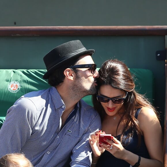 Sofia Essaïdi et son compagnon Adrien Galo - People dans les tribunes de Roland Garros lors de la Coupe Davis. Le 12 septembre 2014