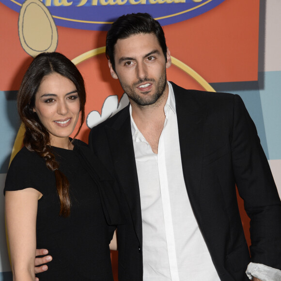 Sofia Essaidi et son compagnon Andrien Galo lors de la présentation en avant-première de la nouvelle attraction "Ratatouille : L'aventure totalement toquée" à Disneyland Paris à Marne-la-Vallée, le 21 juin 2014.
