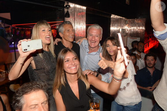 Didier Deschamps fête sa victoire avec sa femme Claude, Nagui et sa femme Mélanie Page et des amis à la Gioia et au VIP Room à Saint-Tropez, le 21 juillet 2018. © Rachid Bellak/Bestimage